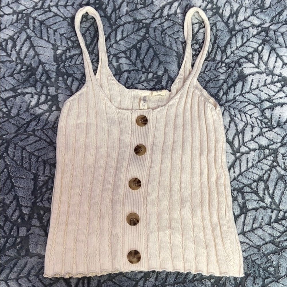 Beige tank with marble buttons down the middle